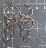 Long multi-hoop earrings - rose gold