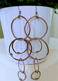 Long multi-hoop earrings - rose gold