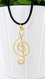 Musical note pendant • light gold