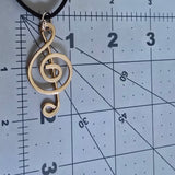 Musical note pendant • light gold